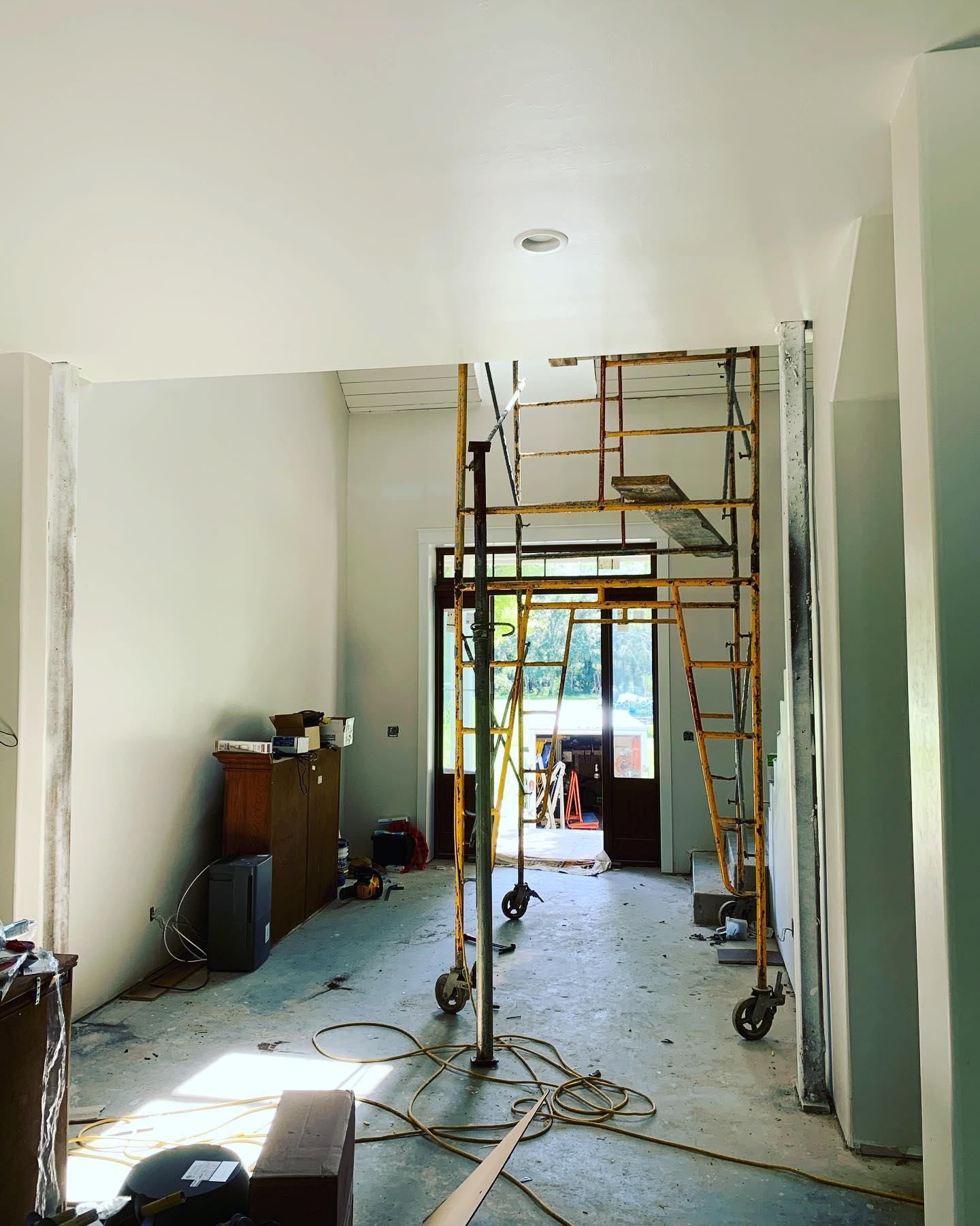 Entry way before wood beam accents