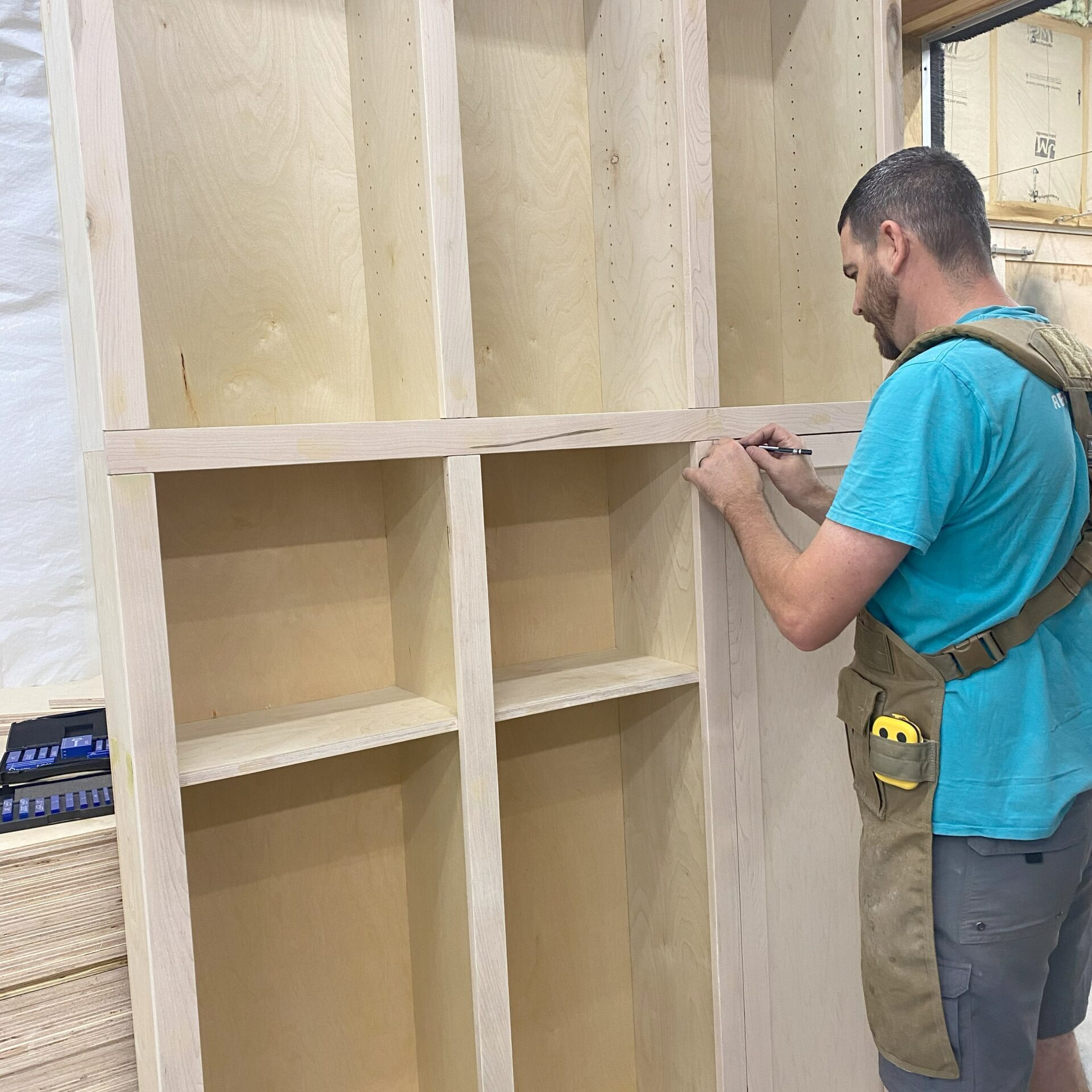 Greg Byrus building cabinets